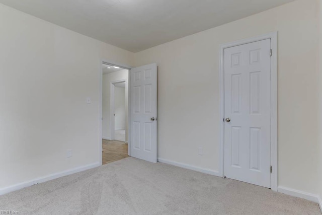 1793 Old Buckroe Rd, Hampton, VA 23664 - unfurnished bedroom with carpet flooring and baseboards