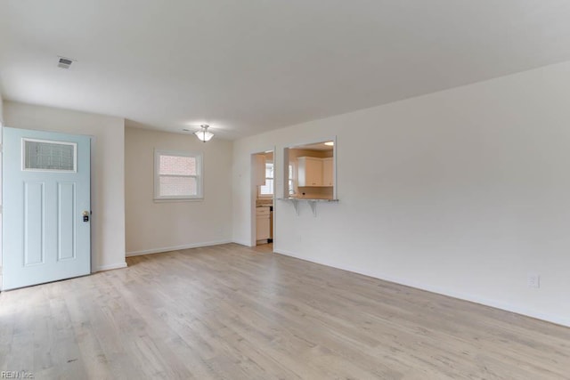 1793 Old Buckroe Rd, Hampton, VA 23664 - interior space featuring visible vents, baseboards, and light wood finished floors