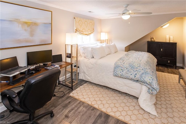 bedroom featuring crown molding, a ceiling fan, and wood finished floors