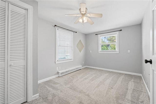 unfurnished bedroom with visible vents, baseboards, a closet, and carpet floors