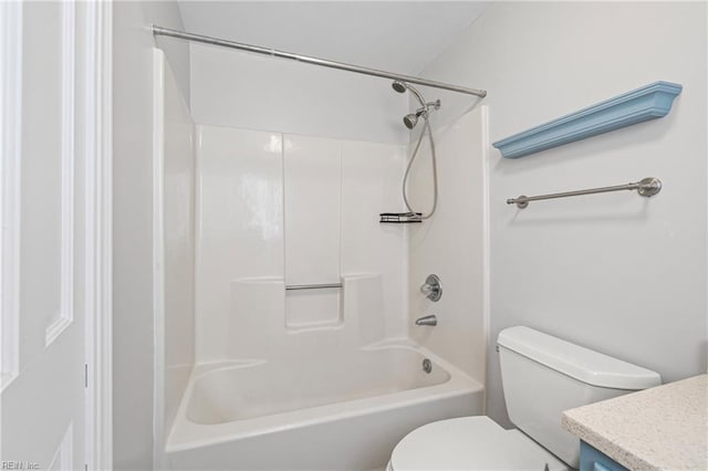 full bathroom featuring bathing tub / shower combination, vanity, and toilet