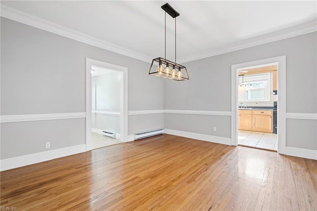 unfurnished dining area featuring light wood-style floors, a baseboard heating unit, baseboards, and ornamental molding