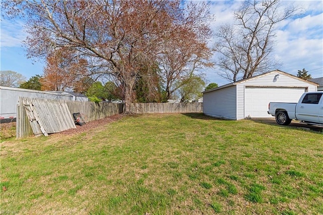 116 Twin Oaks Dr, Hampton, VA 23666 - view of yard with an outdoor structure, fence, and a detached garage