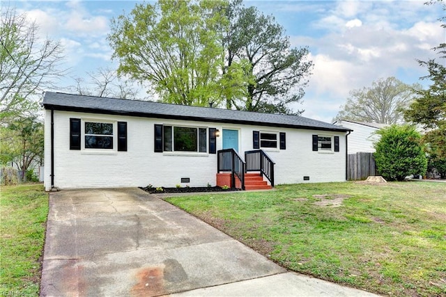 25 Tillerson Dr, Newport News, VA 23602 - ranch-style house featuring a front yard, crawl space, fence, concrete driveway, and brick siding
