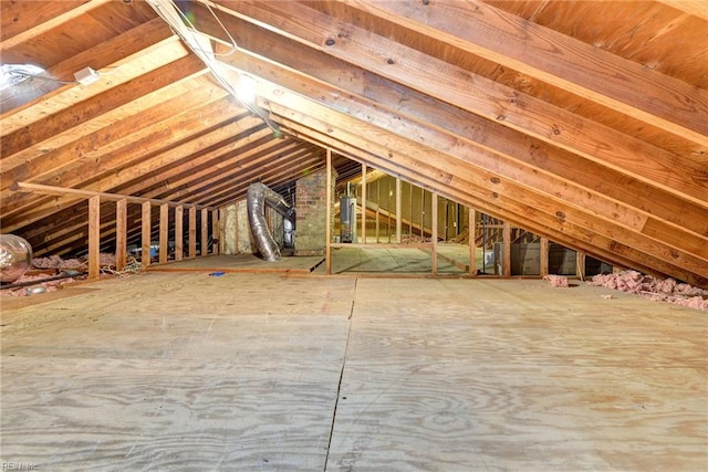 attic featuring water heater