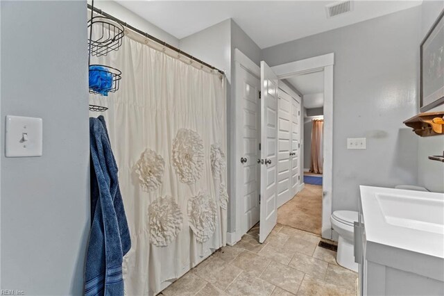 3410 E Princess Anne Rd, Norfolk, VA 23502 - bathroom featuring toilet, vanity, and visible vents