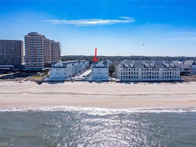 aerial view with a beach view and a water view