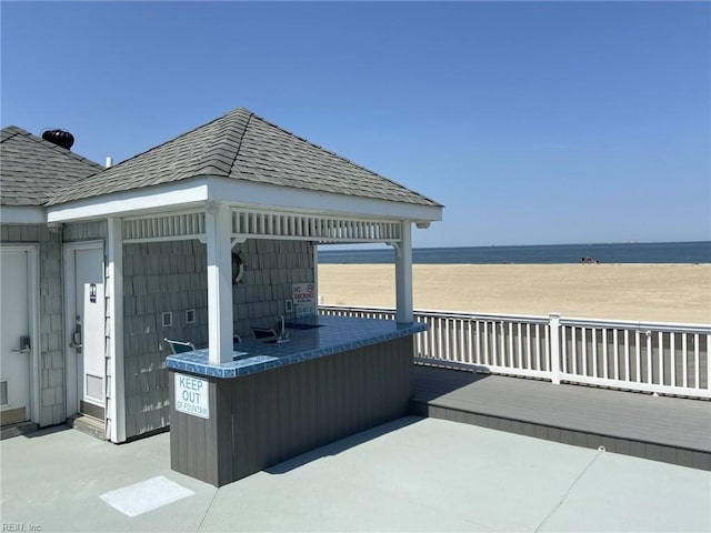 view of patio / terrace featuring a water view
