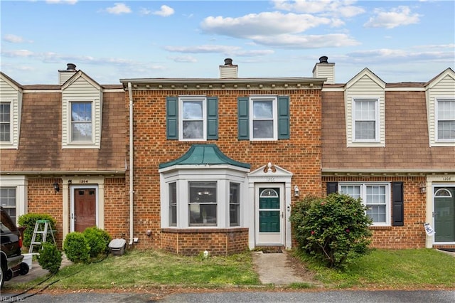1206 Mabry Mill Pl, Chesapeake, VA 23320 - townhome / multi-family property featuring brick siding, a chimney, and roof with shingles