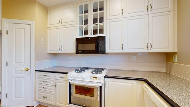 301 Brooke Ave Unit 105, Norfolk, VA 23510 - kitchen featuring backsplash, white cabinetry, white appliances, and glass insert cabinets