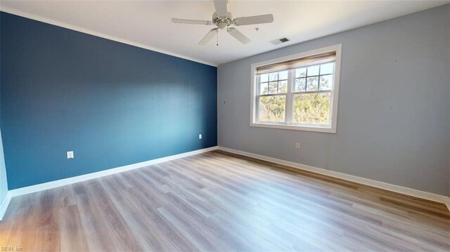 301 Brooke Ave Unit 105, Norfolk, VA 23510 - unfurnished room featuring visible vents, baseboards, and wood finished floors