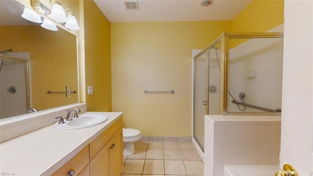 301 Brooke Ave Unit 105, Norfolk, VA 23510 - bathroom with visible vents, toilet, a shower stall, vanity, and tile patterned flooring