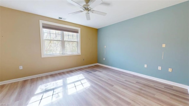 301 Brooke Ave Unit 105, Norfolk, VA 23510 - spare room with light wood-style floors, ceiling fan, baseboards, and visible vents