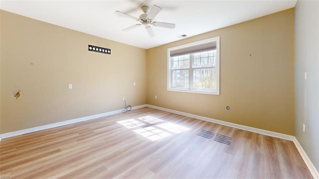 301 Brooke Ave Unit 105, Norfolk, VA 23510 - spare room featuring light wood finished floors, baseboards, and visible vents