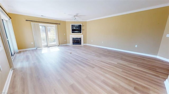 301 Brooke Ave Unit 105, Norfolk, VA 23510 - unfurnished living room with crown molding, baseboards, and a ceiling fan
