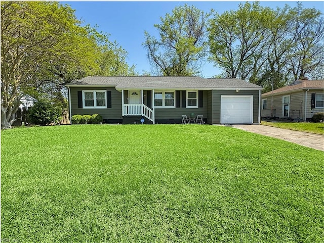 ranch-style home featuring an attached garage, a front lawn, driveway, and crawl space