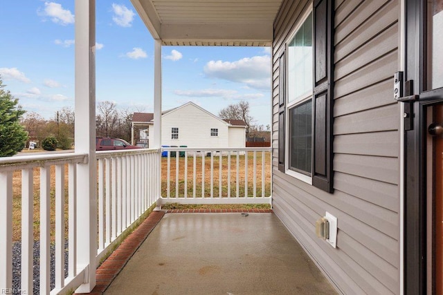 balcony featuring covered porch