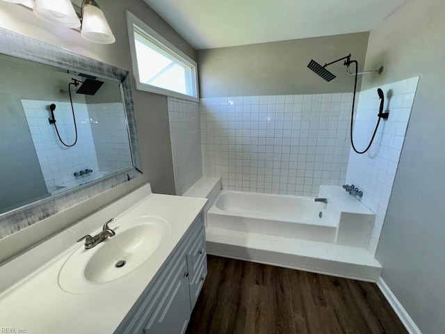 3216 Winterberry Ct, Virginia Beach, VA 23453 - bathroom with vanity, tiled shower / bath combo, and wood finished floors