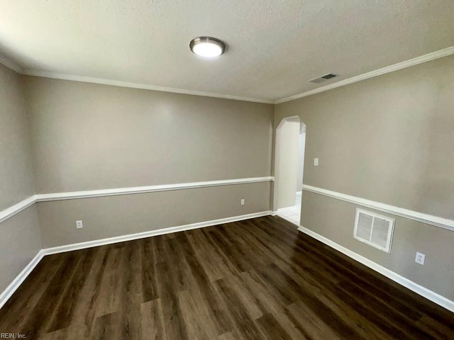 3216 Winterberry Ct, Virginia Beach, VA 23453 - spare room with visible vents, baseboards, arched walkways, ornamental molding, and wood finished floors