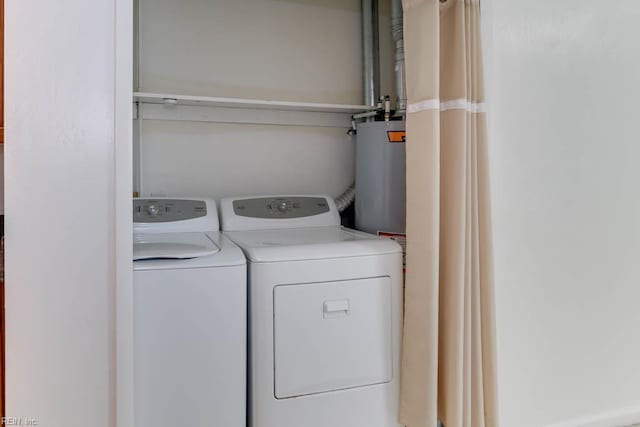 laundry room with independent washer and dryer and laundry area