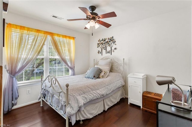 106 Elm Tree Ct, Suffolk, VA 23435 - bedroom with visible vents, baseboards, ceiling fan, and dark wood-style floors