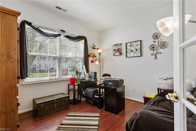 106 Elm Tree Ct, Suffolk, VA 23435 - office area featuring visible vents, baseboards, and wood finished floors