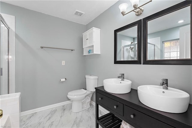 bathroom with baseboards, an enclosed shower, a sink, and visible vents