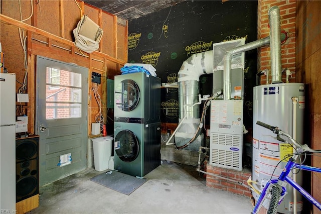 interior space with laundry area, heating unit, stacked washing maching and dryer, and gas water heater