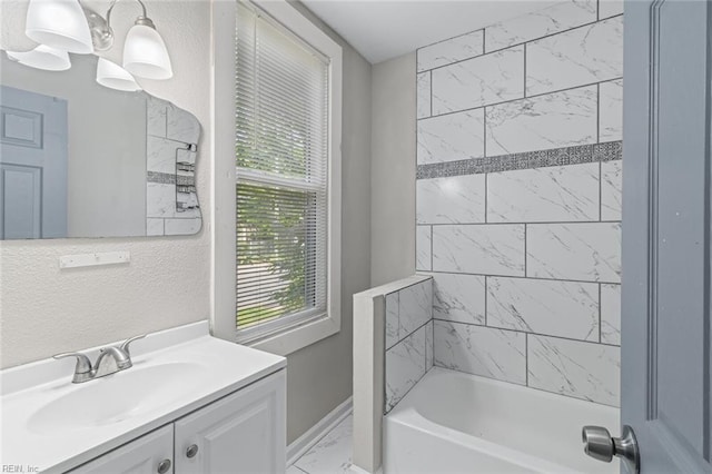 full bath featuring baseboards, shower / bathtub combination, vanity, and marble finish floor