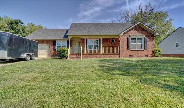 ranch-style house featuring crawl space, an attached garage, a front lawn, and brick siding