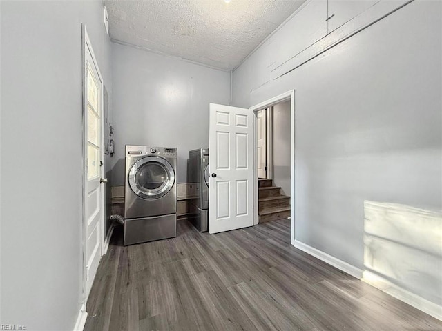 122 Kendall Dr, Newport News, VA 23601 - laundry area with laundry area, a textured ceiling, washer and dryer, baseboards, and dark wood-style floors