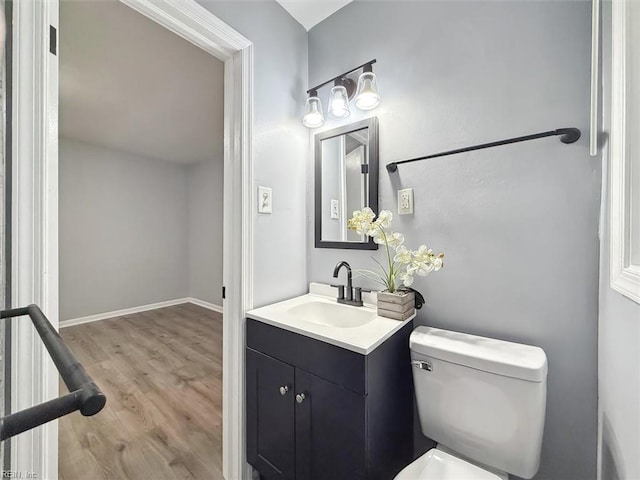 122 Kendall Dr, Newport News, VA 23601 - bathroom featuring vanity, baseboards, toilet, and wood finished floors