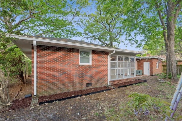 122 Kendall Dr, Newport News, VA 23601 - view of side of home featuring brick siding and a sunroom
