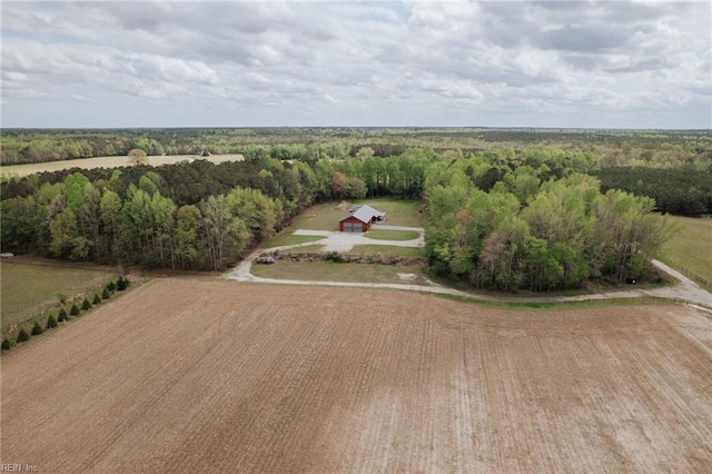 bird's eye view featuring a rural view and a view of trees