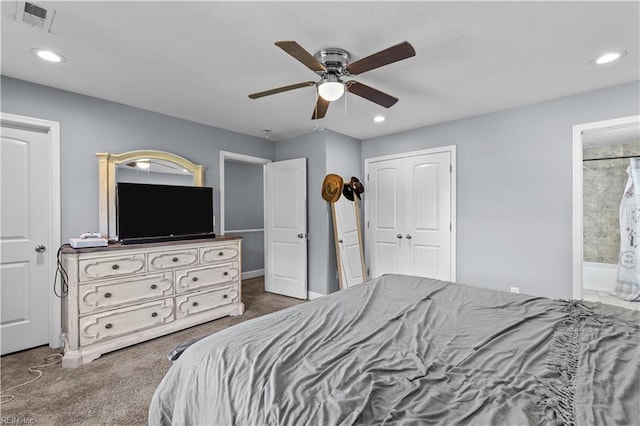bedroom featuring recessed lighting, a closet, and carpet floors