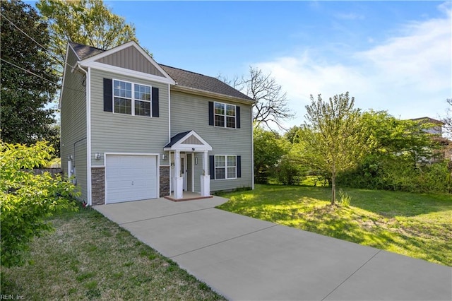 view of front of home with board and batten siding, concrete driveway, a garage, and a front lawn