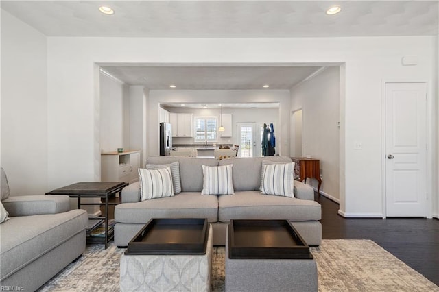 209 Cobblestone Reach Reach, Suffolk, VA 23435 - living room with dark wood-type flooring, baseboards, and recessed lighting