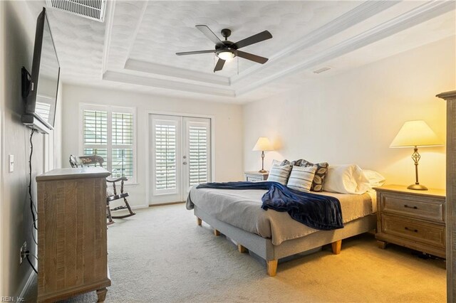 209 Cobblestone Reach Reach, Suffolk, VA 23435 - bedroom with light colored carpet, a ceiling fan, visible vents, access to exterior, and a raised ceiling