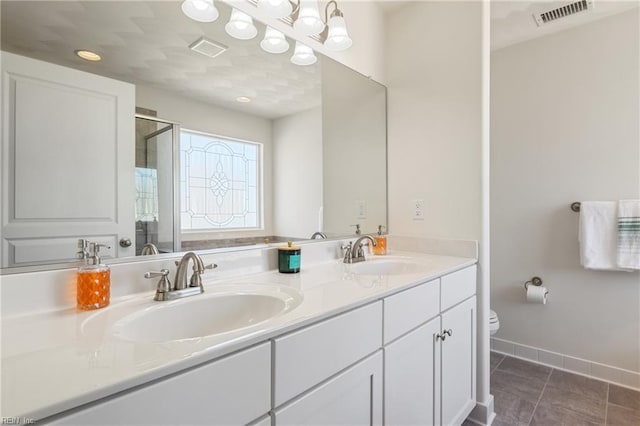 209 Cobblestone Reach Reach, Suffolk, VA 23435 - full bathroom featuring a shower stall, a sink, and visible vents