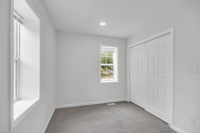 9289 Gates Rd, Suffolk, VA 23437 - unfurnished bedroom featuring a closet, visible vents, recessed lighting, carpet flooring, and baseboards