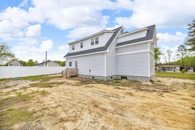 9289 Gates Rd, Suffolk, VA 23437 - back of property featuring crawl space, roof with shingles, and fence
