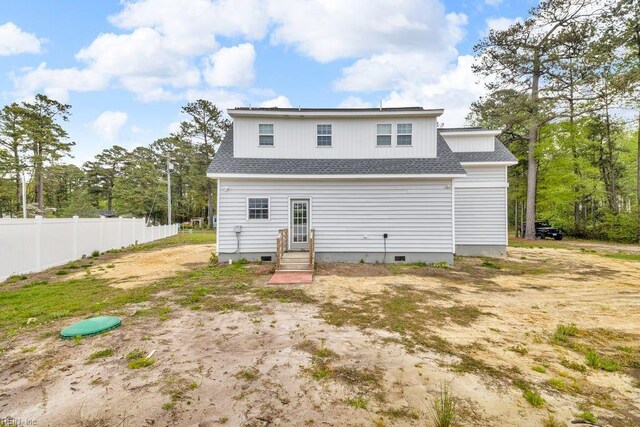9289 Gates Rd, Suffolk, VA 23437 - back of house featuring crawl space, entry steps, a shingled roof, and fence