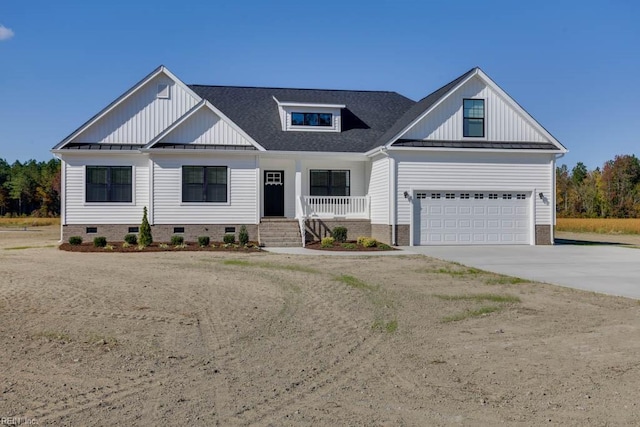 modern farmhouse with concrete driveway, crawl space, board and batten siding, a porch, and a shingled roof