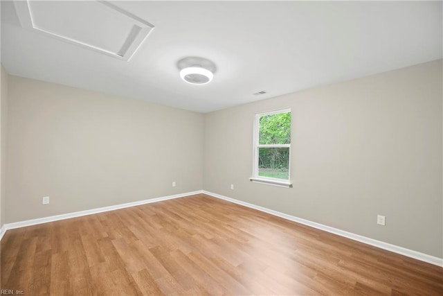 105 Ireland St, Hampton, VA 23663 - unfurnished room with light wood-style flooring, attic access, baseboards, and visible vents