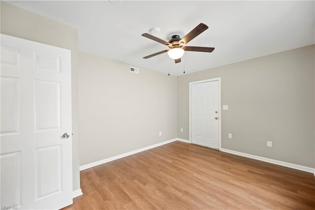 105 Ireland St, Hampton, VA 23663 - spare room with light wood-style flooring, baseboards, a ceiling fan, and visible vents