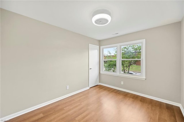 105 Ireland St, Hampton, VA 23663 - unfurnished room with light wood-type flooring and baseboards