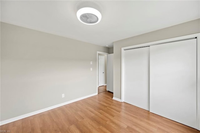 105 Ireland St, Hampton, VA 23663 - unfurnished bedroom with a closet, baseboards, and light wood-style floors
