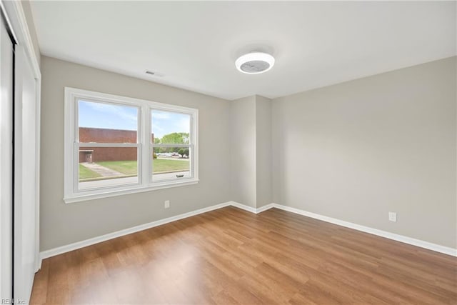 105 Ireland St, Hampton, VA 23663 - unfurnished room with visible vents, light wood-style flooring, and baseboards