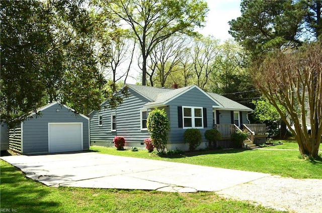 view of front facade with a garage, crawl space, an outdoor structure, a front yard, and driveway