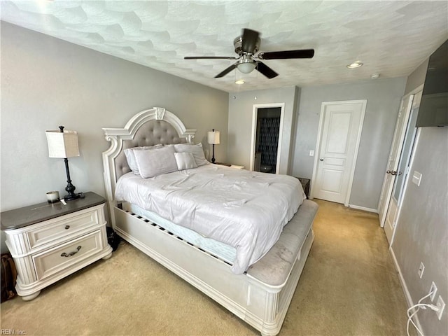 bedroom with ceiling fan, baseboards, recessed lighting, and light colored carpet